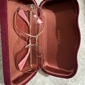 Gucci Gold Frame Sunglasses with Pink Temple Tips